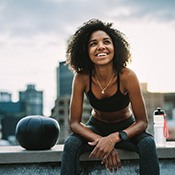 smiling active person sitting down